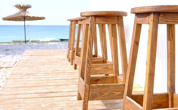 Strandbar Holzhocker Einer Reihe Nahaufnahme — Stockfoto