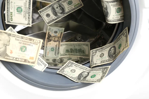 Dinero en lavadora —  Fotos de Stock