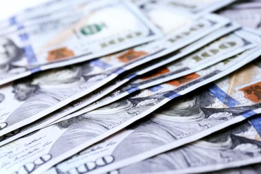 Birçok yüz dolar nakit para arka plan olarak