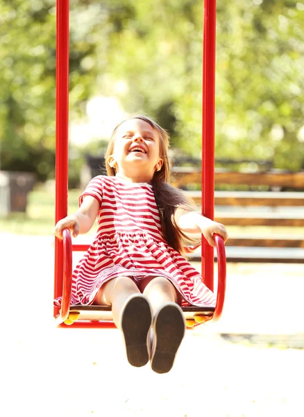 Little girl on swing — Stock Photo, Image