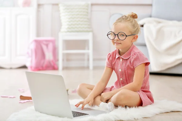 Little girl with laptop — Stock Photo, Image