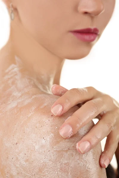 Woman using scrub — Stock Photo, Image