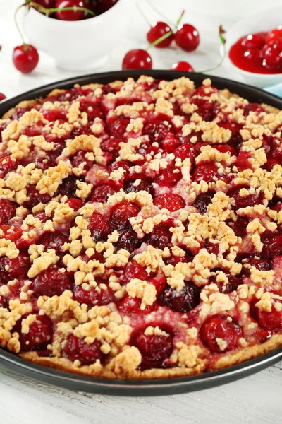 Tasty homemade pie with cherries on table close up — Stock Photo, Image