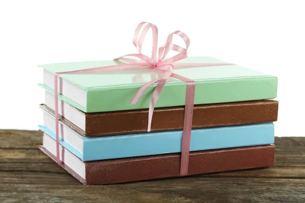 Stack of books with ribbon — Stock Photo, Image