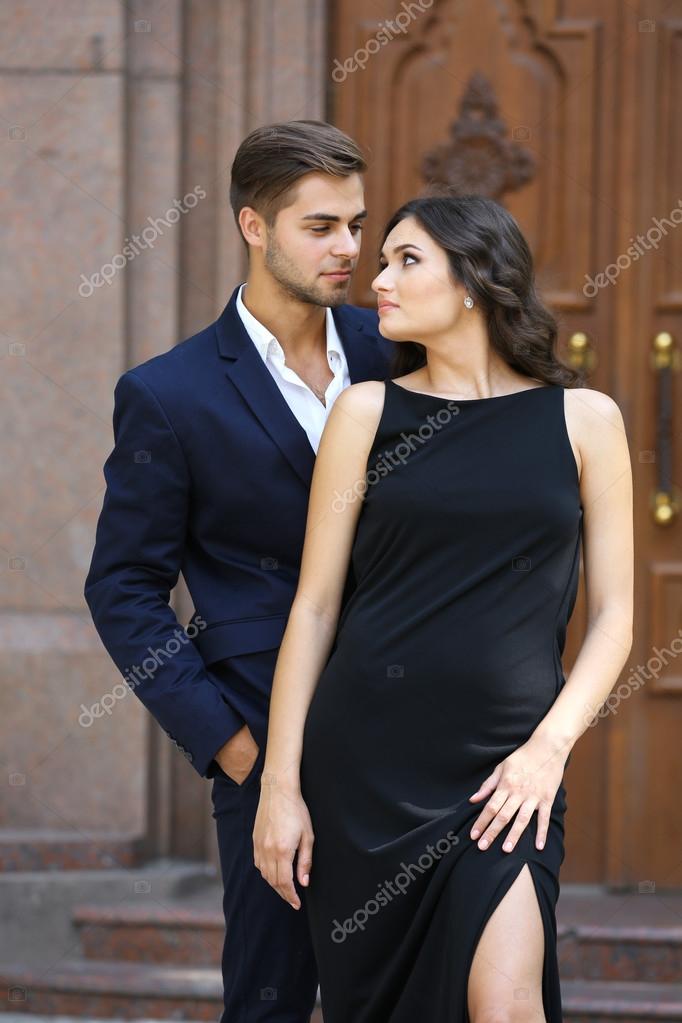Elegant couple posing Stock Photo by ©belchonock 87845590