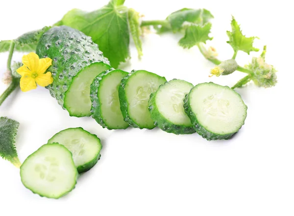 Sliced cucumbers with leafs isolated on white background — Stock Photo, Image