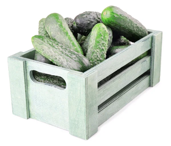 Ripe cucumbers in wooden box — Stock Photo, Image