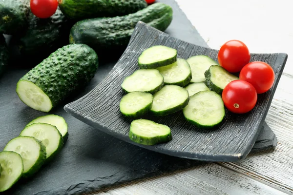 Sliced cucumbers with tomatoes — Stock Photo, Image