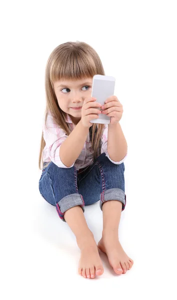Beautiful little girl with mobile phone — Stock Photo, Image