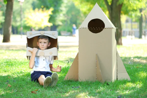 Funny boy in carton helmet — Stock Photo, Image