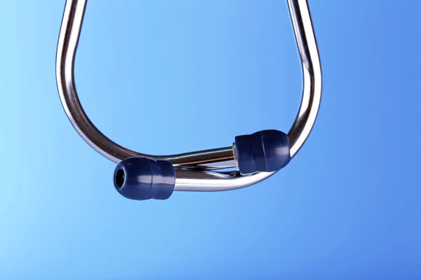 Stethoscope close-up on blue background — Stock Photo, Image