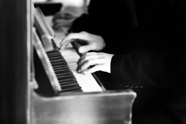 Teacher trains to play piano little girl — Stock Photo, Image