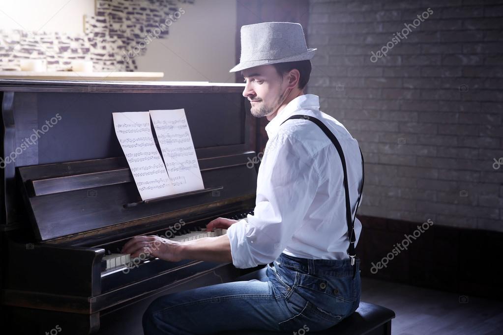 Men playing piano with their penis