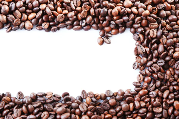 Granos de café sobre blanco — Foto de Stock
