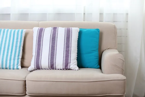 Comfortable sofa with colourful pillows — Stock Photo, Image