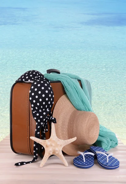 Suitcase and accessories for travelling — Stock Photo, Image