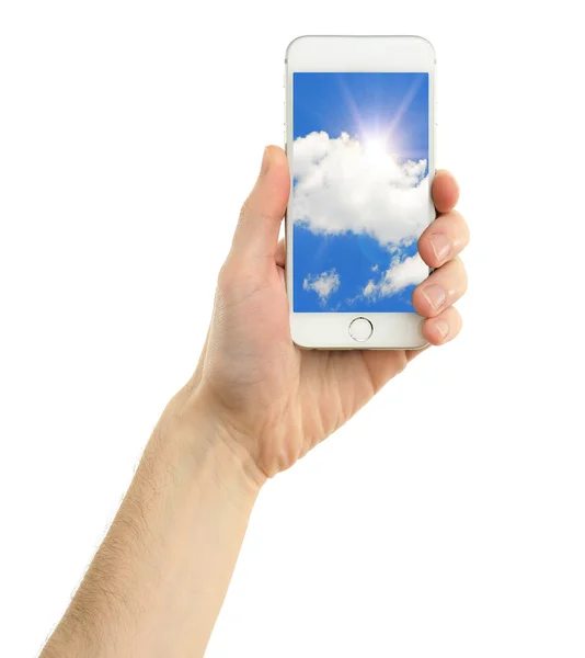 Mano celebración de teléfono inteligente móvil con el cielo en la pantalla . —  Fotos de Stock