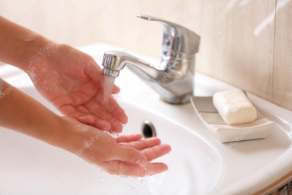 Washing of hands with soap