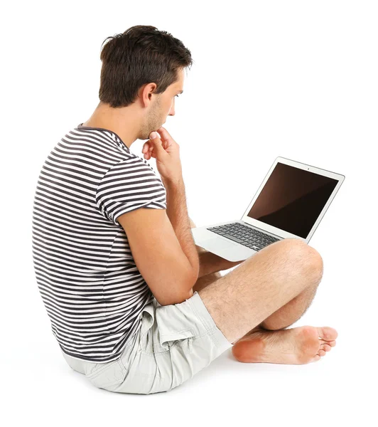 Jonge man met laptop — Stockfoto