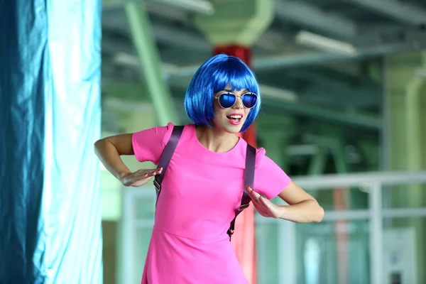 Woman in dress posing like doll — Stock Photo, Image