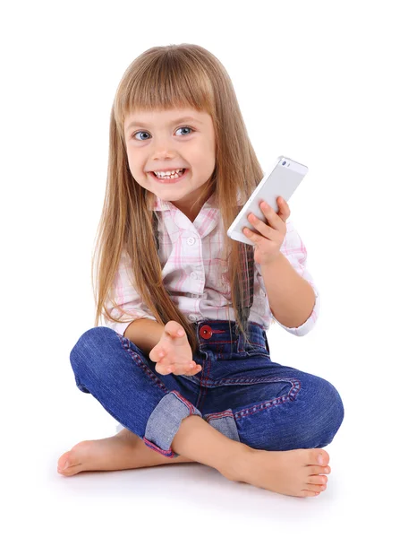 Belle petite fille avec téléphone portable — Photo