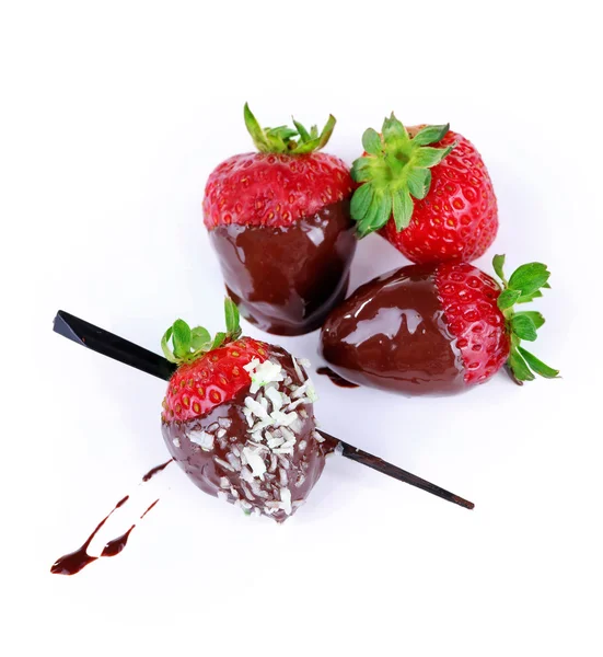 Delicious strawberries in chocolate and coconut flakes isolated on white — Stock Photo, Image