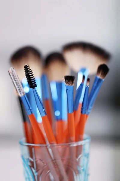 Cosmetic brushes in glass — Stock Photo, Image