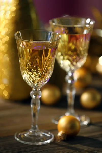 Champagne and Christmas decoration on bright background Stock Photo