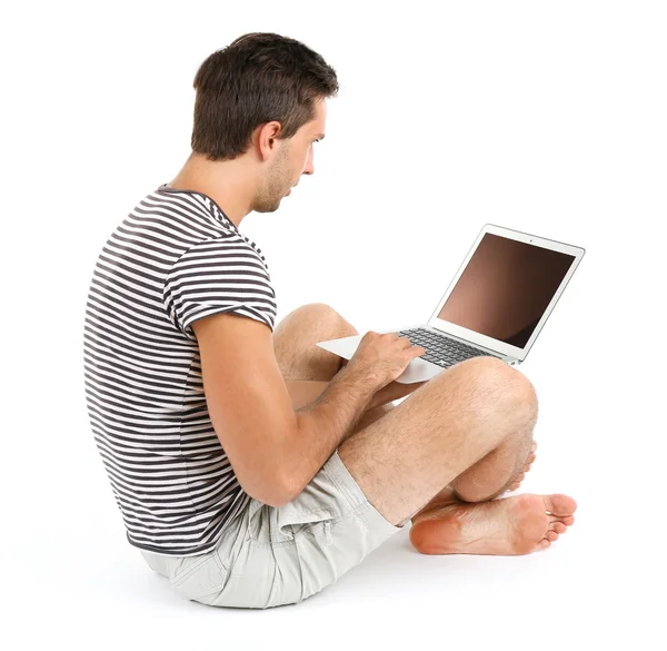 Jonge man met laptop — Stockfoto