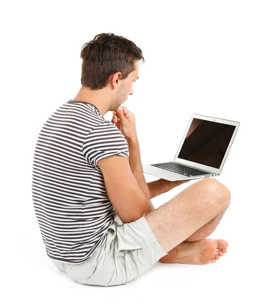 Jonge man met laptop — Stockfoto