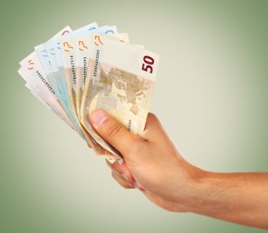 Euro banknot ile el