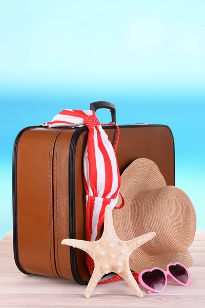 Suitcase and accessories for travelling — Stock Photo, Image
