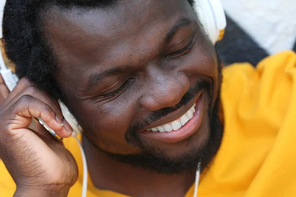 African American man listening music — Stock Photo, Image