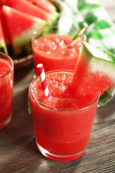 Glasses of watermelon juice on wooden table, closeup — Stock Photo, Image