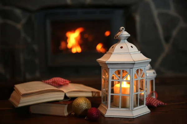 Book and candles on vintage table — Stock Photo, Image