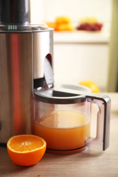 Juicer and orange juice — Stock Photo, Image