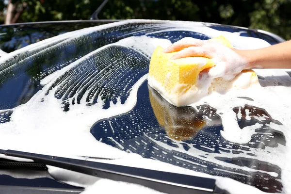Hand washing car window — Stock Photo, Image