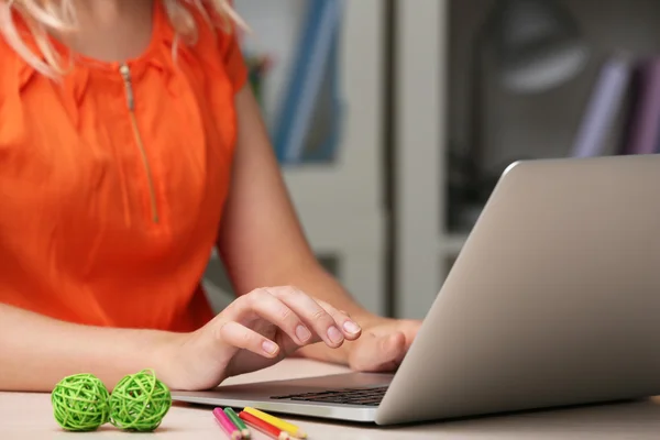 Woman using laptop on workplace close up — Stock Photo, Image