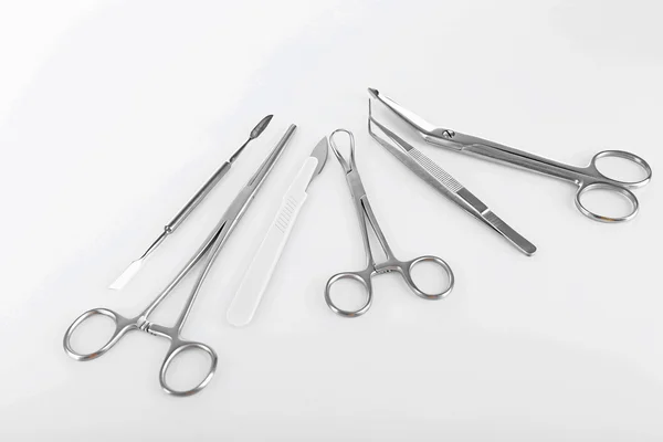 Surgery instruments isolated on white — Stock Photo, Image