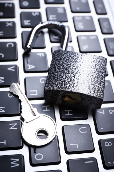 Lock on the laptop keyboard background, close up — Stock Photo, Image