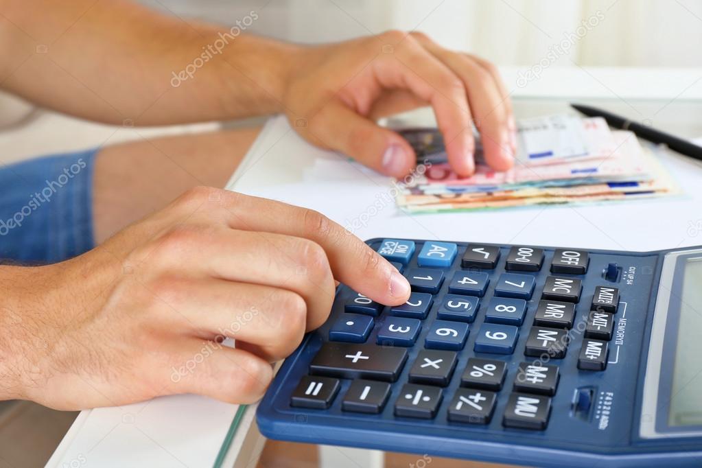 Hands Calculating money