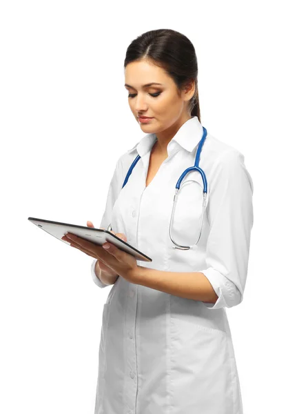 Smiling medical doctor holding a tablet — Stock Photo, Image