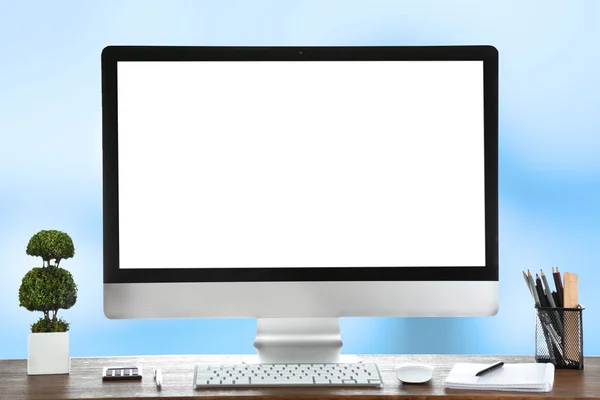 Computer on wooden table — Stock Photo, Image