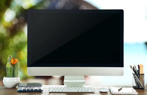 Computer on wooden table — Stock Photo, Image