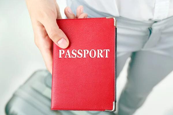 Hand holding passport — Stock Photo, Image