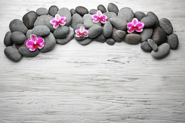 Spa stones and orchids — Stock Photo, Image