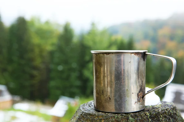 Coffee on wooden fence — Stock Photo, Image