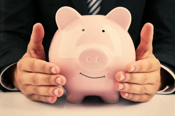 Man with piggy bank — Stock Photo, Image