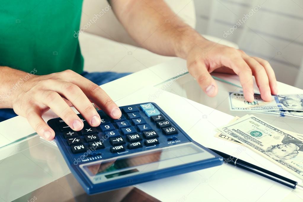 Hands Calculating money