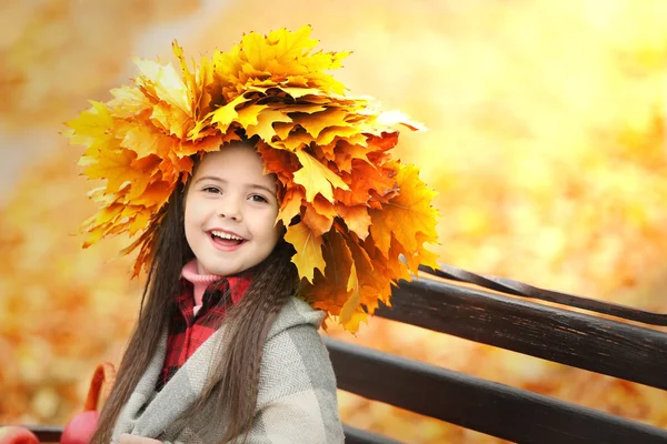 Happy young girl in yellow  wreath — Stock Photo, Image